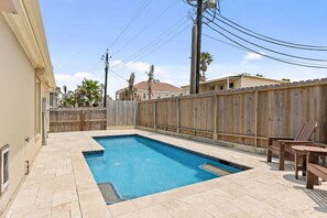 Sparking pool. Fully fenced back yard. 