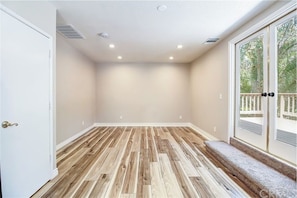 Livingroom and dining area. Access to private deck.