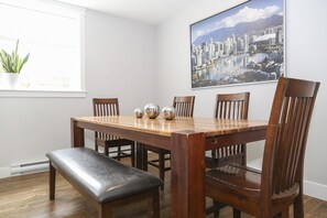 Bright dining dining area with large dining table