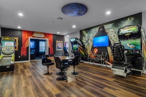 Game room with Skee-Ball and multiple arcades