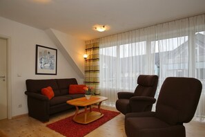 Wohnzimmer mit Schlafcouch