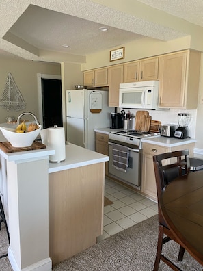 Open kitchen, dining and living area.