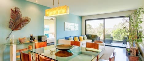 Gorgeous dining table for 6 and comfy living area that opens to your private balcony!