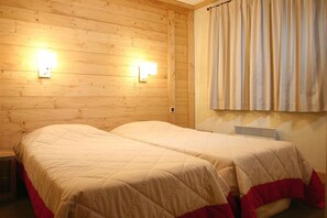 Get a peaceful night sleep in our cozy bedroom.