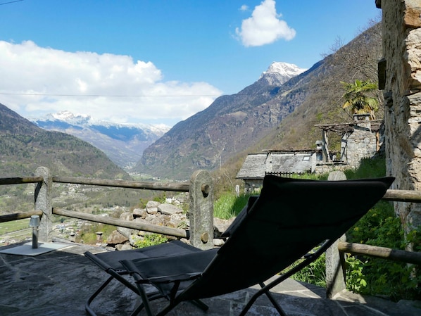 Cloud, Sky, Mountain, Plant, Property, Nature, Building, Highland, Outdoor Furniture, Natural Landscape