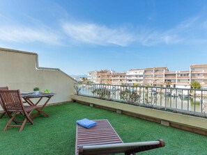 Sky, Cloud, Building, Property, Furniture, Outdoor Furniture, Plant, Outdoor Bench, Table, Wood