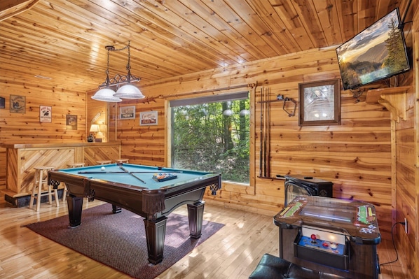 Game room with pool table, and arcade game | Sleepy Willow s by Great Smoky Mountains Cabin Rentals | Gatlinburg Cabin Rentals | Pigeon Forge Cabin Rentals | cabin rentals with hot tubs