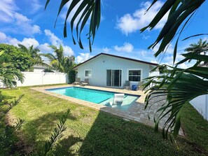 New Pool and green private backyard area