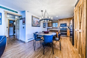 Kitchen - Open kitchen and dining area.
Behind the door in the hallway, you will find washer & dryer.