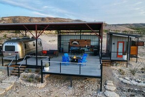 View of Big Bend StarGazer Airstream, Deck, and Bathhouse