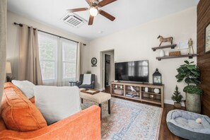 Cozy living room with smart tv, perfect for binging your favorite shows