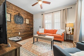 Cozy living room with smart tv, perfect for binging your favorite shows