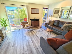 Living room next to private patio overlooking Old Town Park City.