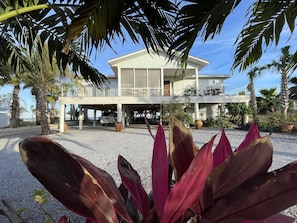 Bay front living that is beautifully landscaped and dock for water activities 