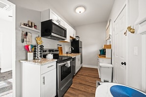 Compact sized kitchen fully stocked to make a snack or a 3 course meal!