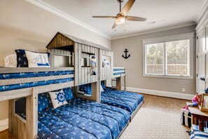 Amazing built in kids bunk room with two twin over full bunks.