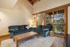 Spacious living room with high vaulted ceilings