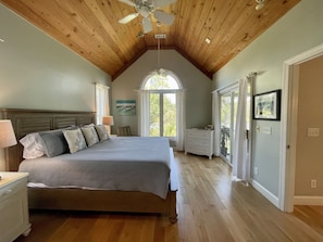 Master bedroom on main floor with views of Deer Lake 