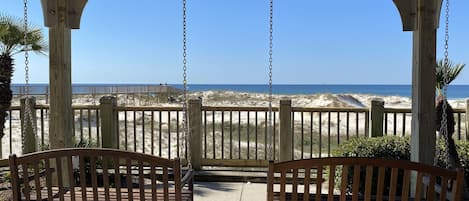 Swinging and watching waves.