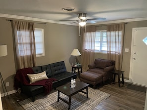 Perfect space to relax or read in oversized chair.  Sofa converts to sleeper.