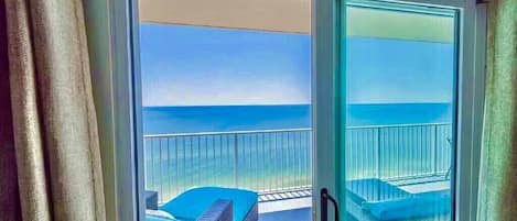 Step out of the master on to your private balcony and listen to the waves.