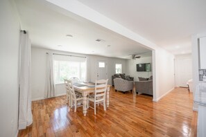 The kitchen opens up into the dining and living room.