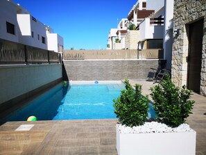 Private swimming pool (6m x 3.3m) with water feature and LED coloured lights 