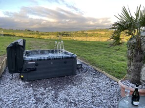 Hot tub and BBQ area with countryside views