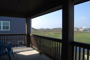 Blue Breeze Heaven upstairs back porch view of the dunes. 