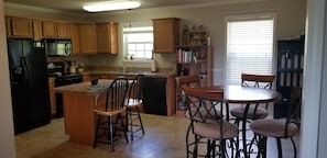 Fully stocked Kitchen with snack and coffee/tea/wine bar!