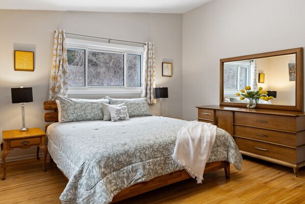 Spacious principal bedroom with King bed and ensuite bathroom