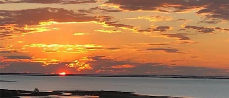 Sunset over West Bay at Pointe West.