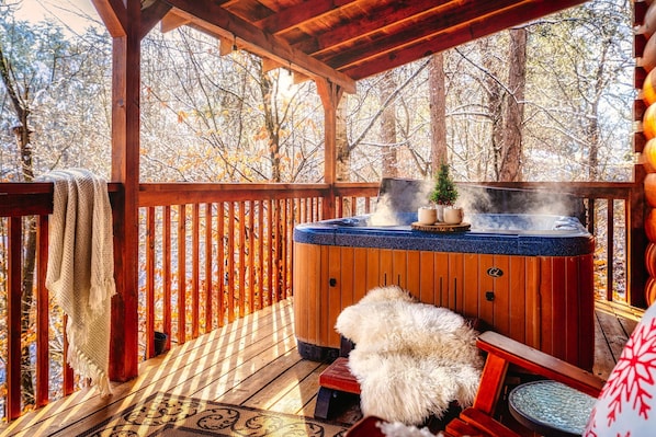 Relax in our private outdoor hot tub, surrounded by nature's beauty. Melt away worries and stress while enjoying quality time with loved ones in this serene retreat.