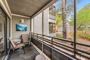 Start your day with coffee on the screened-in porch.