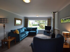 Comfortable seating within living area | March Brown, Garmouth, near Elgin