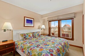 "Escape to our luxurious bedroom, featuring a comfortable king bed.