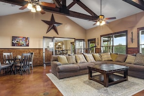 Lone Star touches and stone work throughout the retreat give it a robust and welcoming ranch feel.