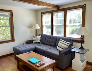 Cozy living room with a lift-top coffee table to working and relaxation