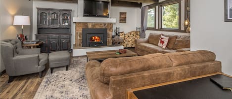 Cozy up by the fire and enjoy the view | Main Level