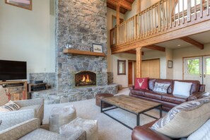 The living area is perfect for catching up | Main Level