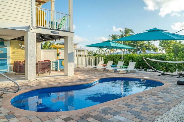 Pool deck, backyard view