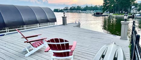 Spacious private dock and boat slip. 