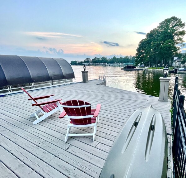 Spacious private dock and boat slip. 