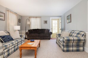 spacious living room with lots of seating for great conversations!