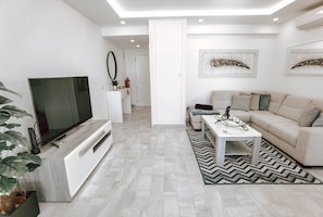 Salon avec Smart TV et WI-FI
