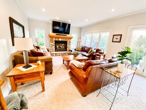 Living room w/gas fireplace and smart TV