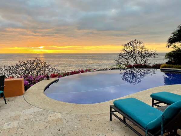 Infinity-edge pool at sunset.  Enjoy sunset views 365 days per year.
