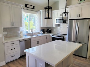 kitchen, all new. with quartz island and counter tops.