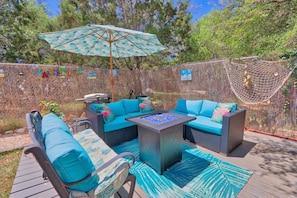 Private seating area with grill and fire pit