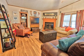 Cozy living room with fireplace and TV